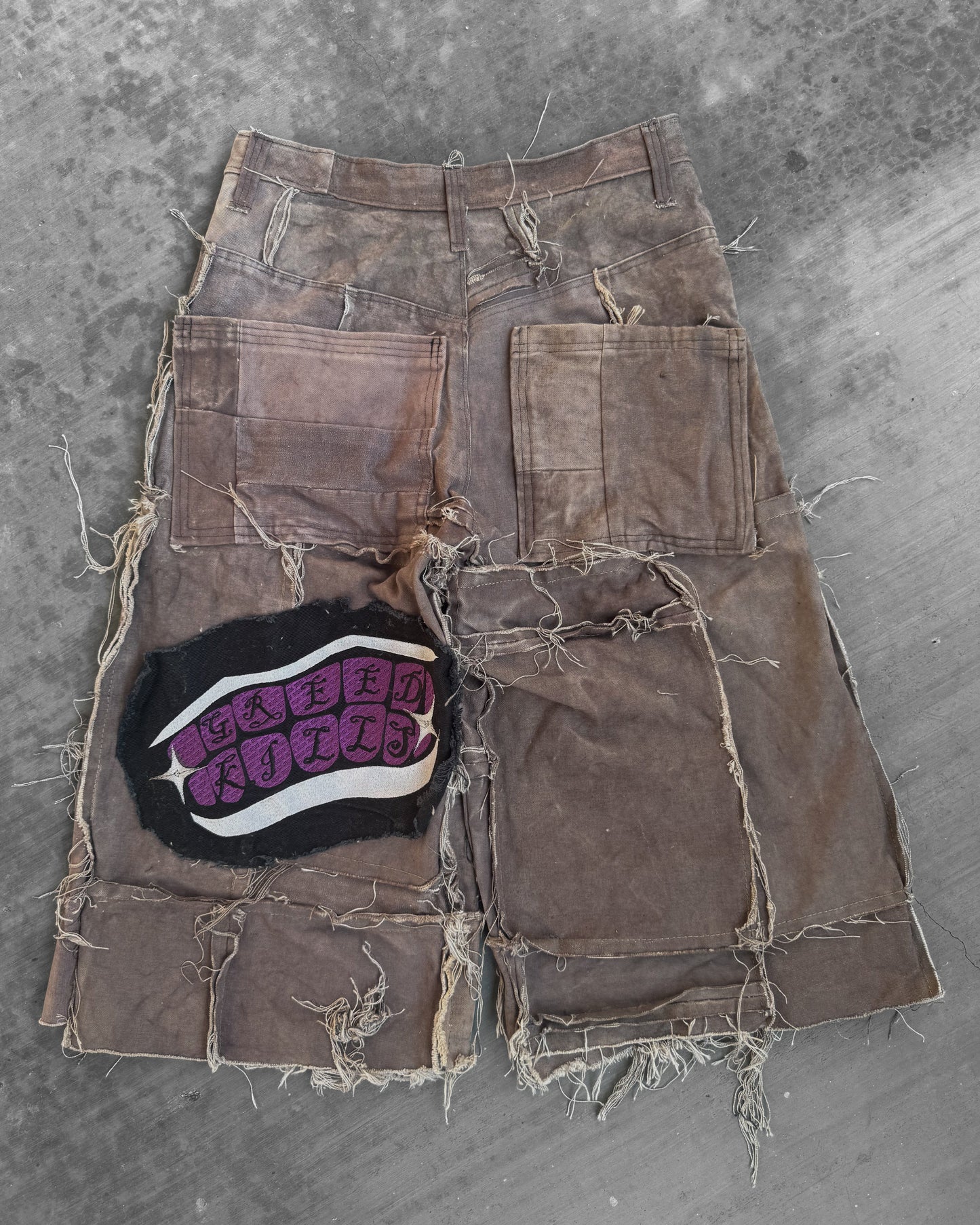 'GREED' JORTS